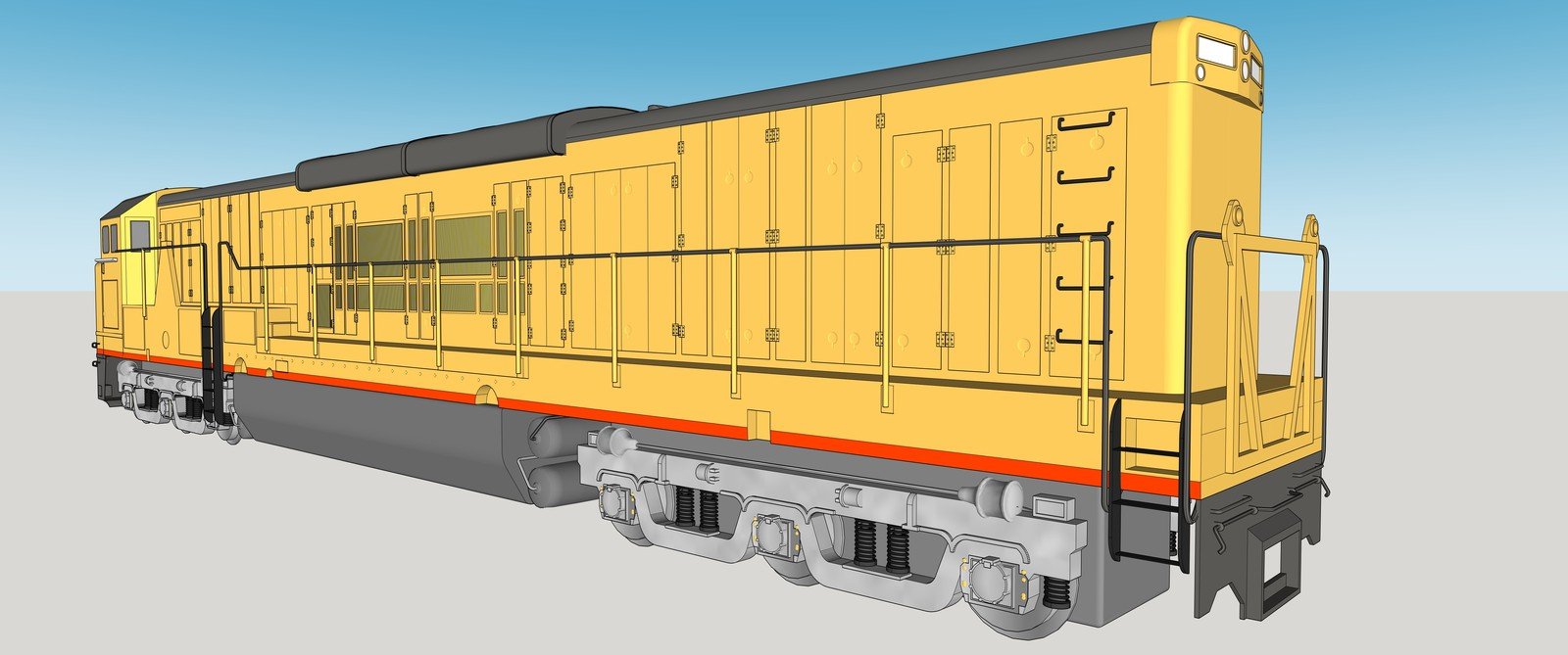 Long yellow locomotive model in a rear three-quarter view