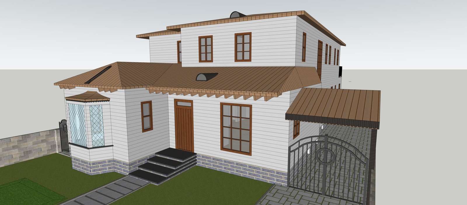 Malibu residence model with a white exterior and courtyard gate