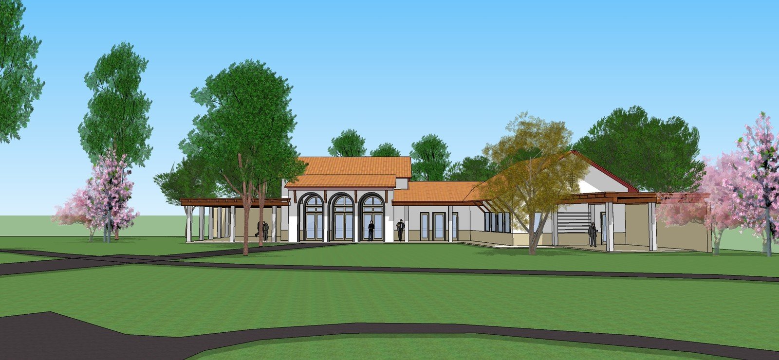 School campus model showing the central entry and classroom wings